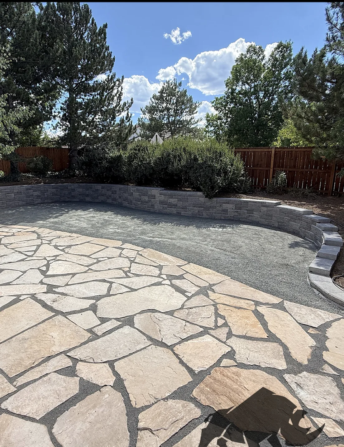 After — finished flagstone patio and wall
